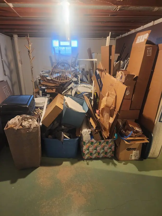 Roll-off dumpster container at job site for 2 Yard Dumpster Rental in Smithfield